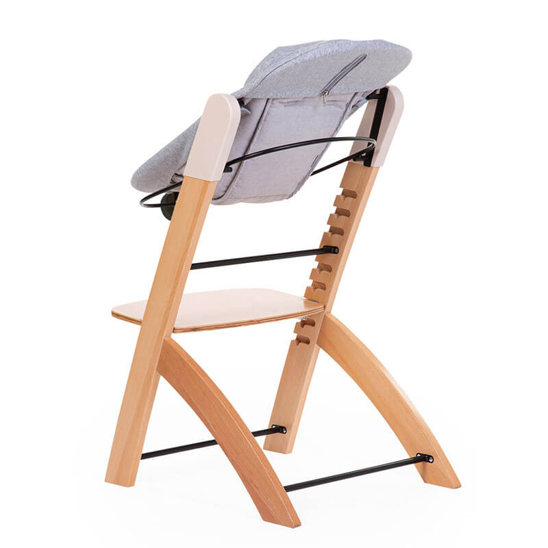 Chaise haute Evosit avec son set nouveau-né Childhome set dos