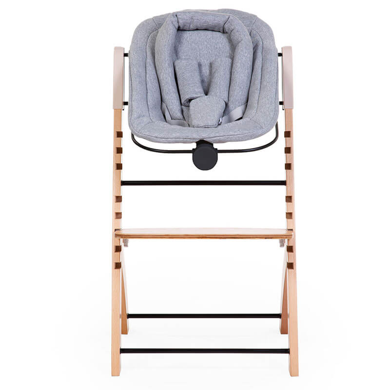 Chaise haute Evosit avec son set nouveau-né Childhome set face