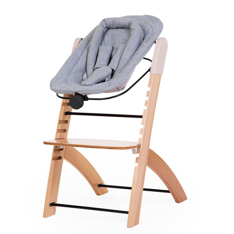 Chaise haute Evosit avec son set nouveau-né Childhome