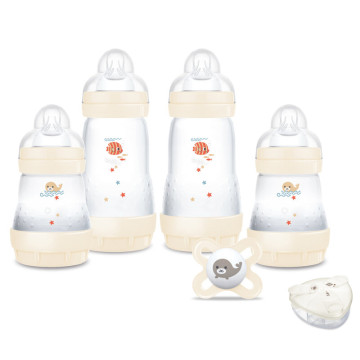 Coffret naissance 4 Biberons, Sucette et Boîte doseuse Coton
Mam produit face