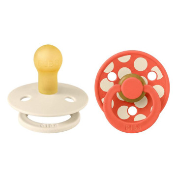 Lot de 2 sucettes Studio Polka Caoutchouc naturel 0-6 mois Ivory/Tango BIBS profil