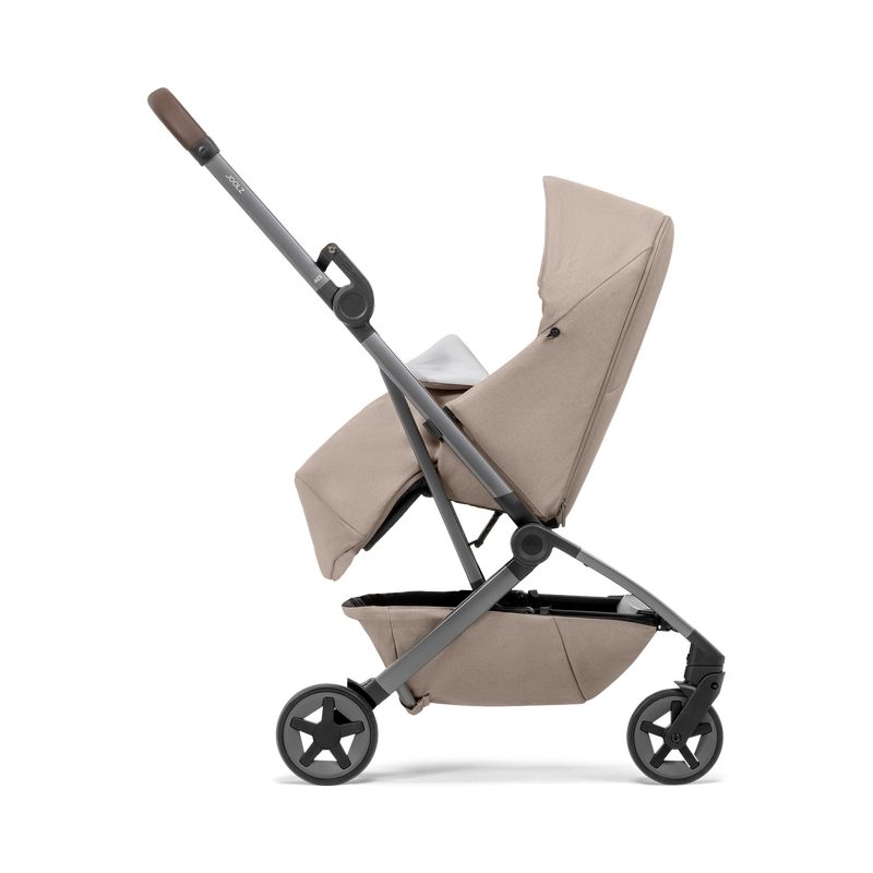Du cocon au siège Joolz Aer2 Sandy taupe Joolz vue côté assise droite avec tablier