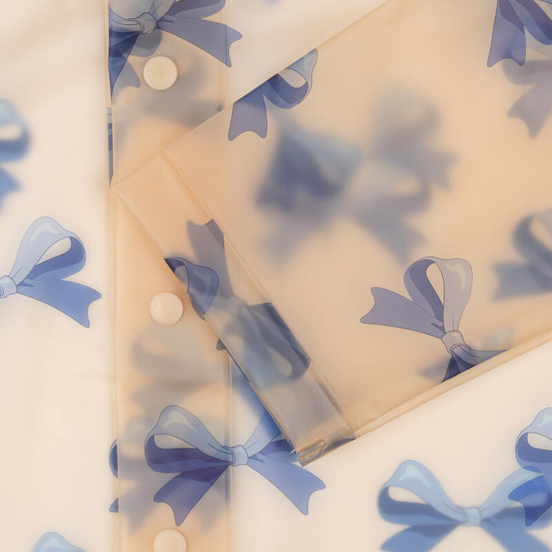 Imperméable Brume avec Noeuds Bleus Konges Slojd motifs
