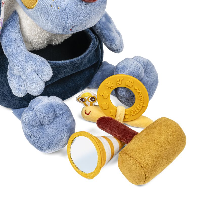 Jules bricoleur surprises Lilliputiens outils devant peluche