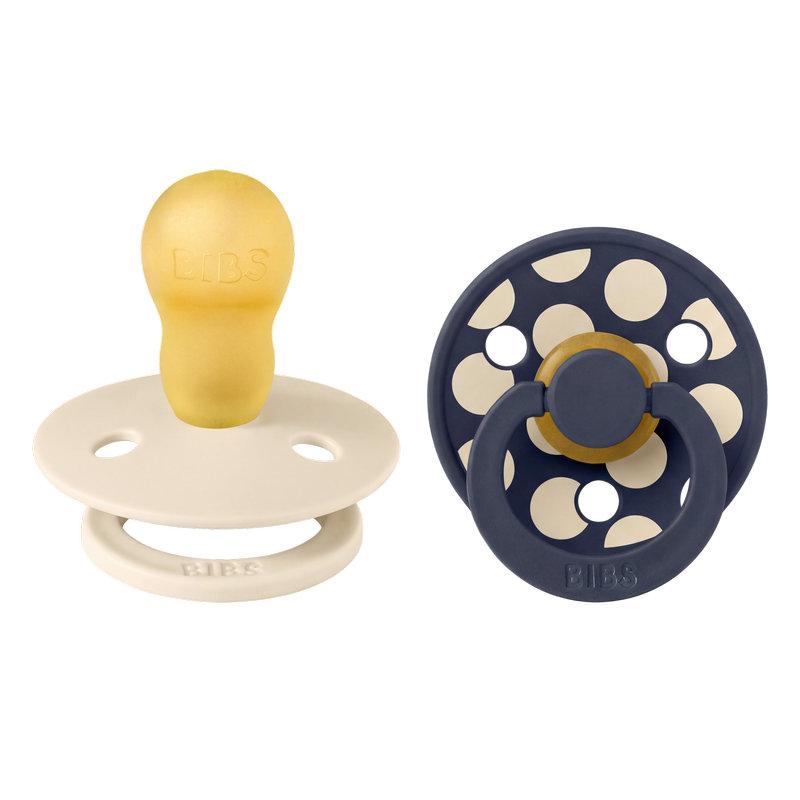 Lot de 2 sucettes Studio Polka Caoutchouc naturel 0-6 mois Ivory/Deep Space BIBS profil