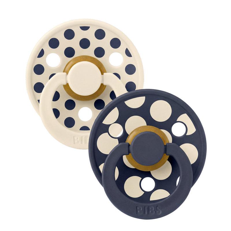 Lot de 2 sucettes Studio Polka Caoutchouc naturel 0-6 mois Ivory/Deep Space BIBS face