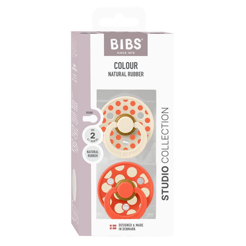 Lot de 2 sucettes Studio Polka Caoutchouc naturel 6-18 mois Ivory/Tango BIBS boite