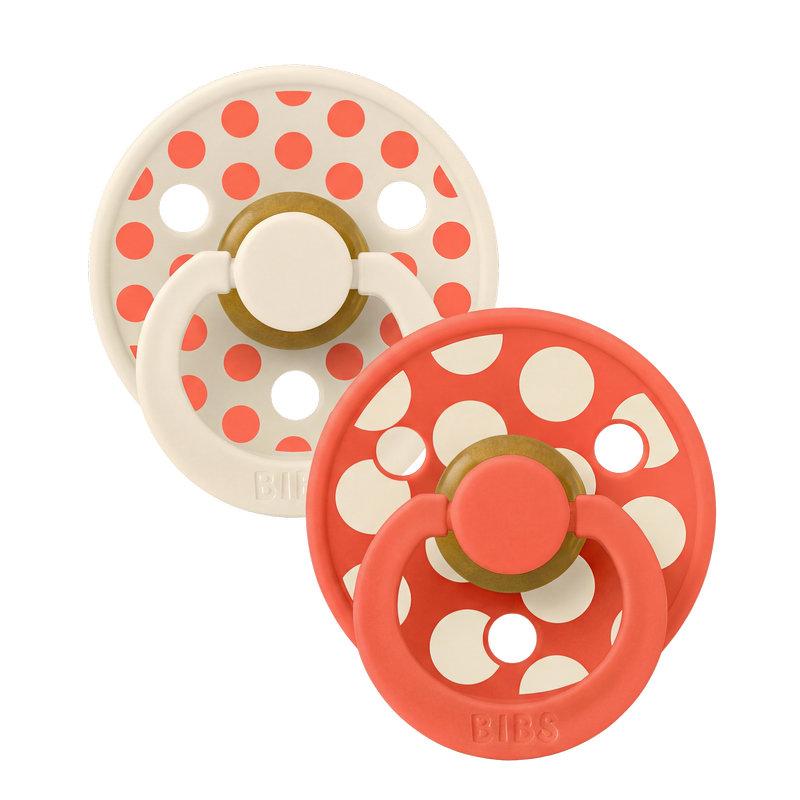 Lot de 2 sucettes Studio Polka Caoutchouc naturel 6-18 mois Ivory/Tango BIBS face