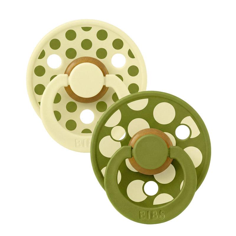 Lot de 2 sucettes Studio Polka Caoutchouc naturel 6-18 mois Luna/Wasabi BIBS face