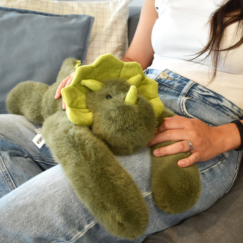 Peluche dinosaure vert lesté 40 cm Podcoll Produit sur jambes