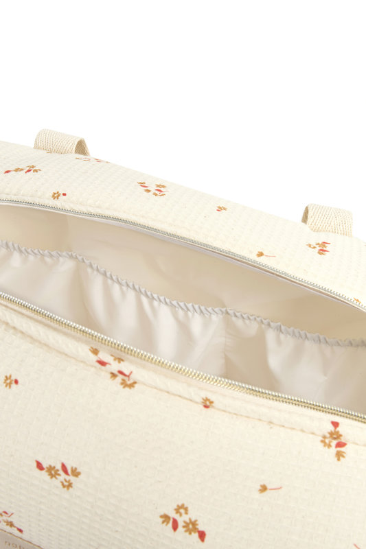 Sac à langer imperméable Opera Yellow lily Nobodinoz intérieur