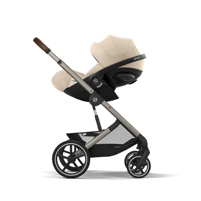 Siège-auto Cloud G3 i-Size groupe 0+ Plus Almond Beige CYBEX sur poussette
