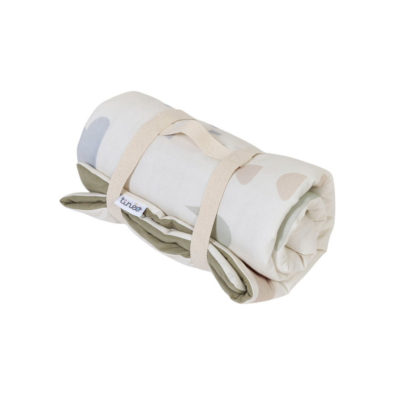 Tapis de jeu Nomade Dinosaures TINEO enroulé